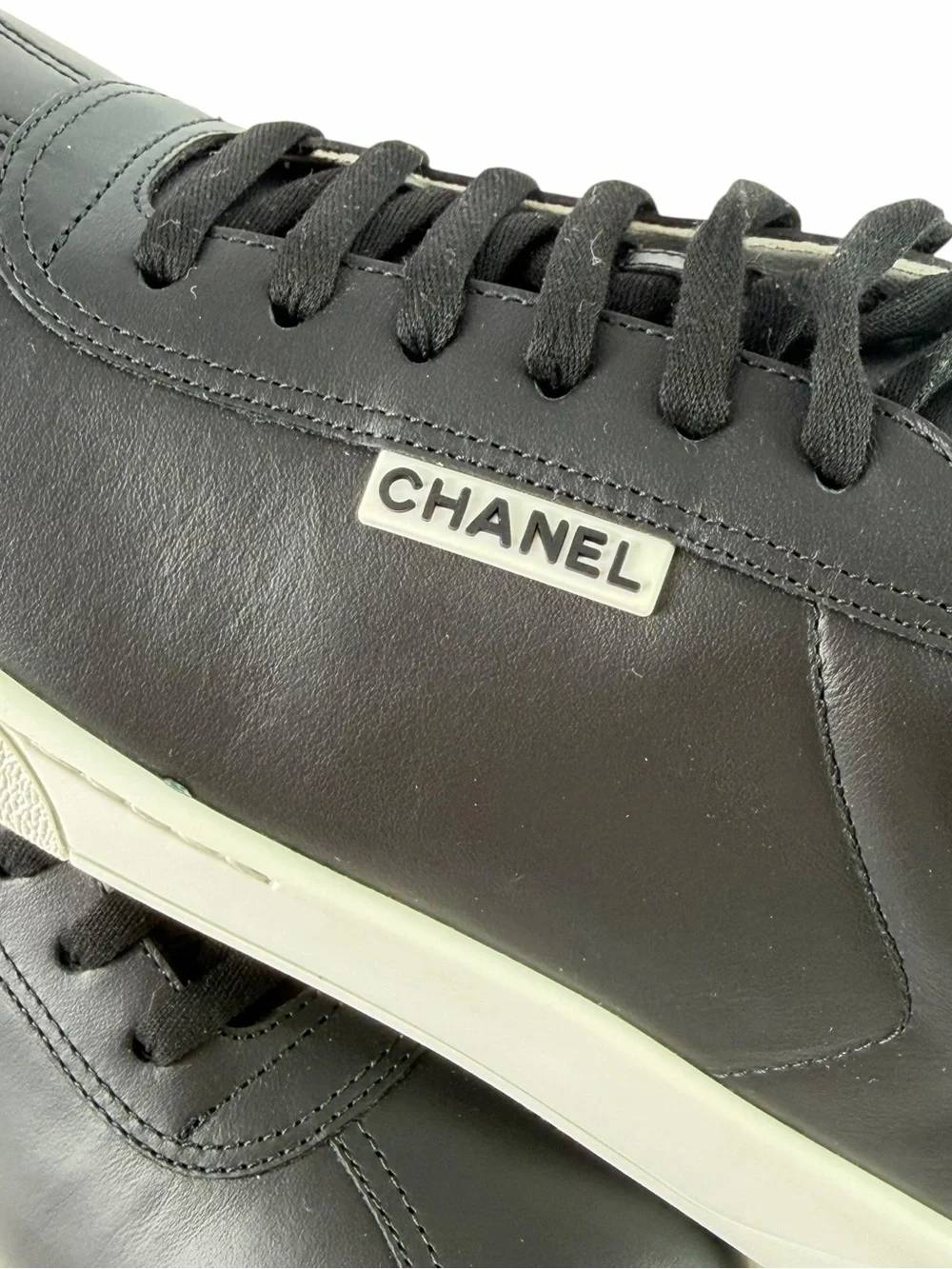 CHANEL Uniform Black Leather Low Top Unisex Sneakers Marked as 42 - W 11 - M 9